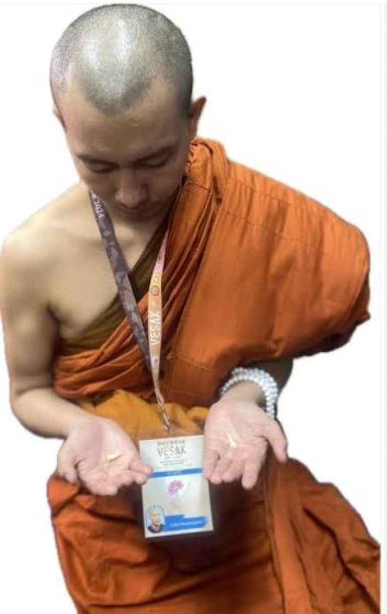 Venerable Sao Dhammasami presenting tradition-associated relic materials during a heritage activity